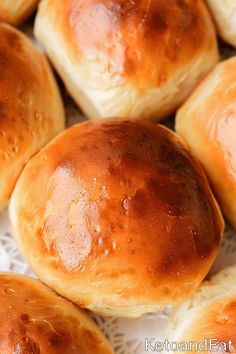 closeup of bread rolls on a white doily