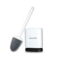 a white brush sitting on top of a hair dryer