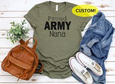 "*CURRENT PROCESSING TIME: 3-6 business days before shipment* Army Mom shirt, Army sister shirt, Basic Training Mom shirt, Army wife shirt This listing is for the following: PERSONALIZED short sleeve shirt : \"Proud ARMY \"  COLOR OF SHIRT: Heather Olive -- Text is in black These are UNISEX shirts.  Bella+Canvas brand. Super soft and comfy! Want a PROMO CODE?  Make sure to sign up for emails! Please visit here to subscribe: https://mailchi.mp/157ecc4dad66/aboutasprout *A note about our process: Army Sister, Skeet Shooting, Army Mom Shirts, Girl Shirts, Army Mom, Army Shirts, Army Wife, Gardening Shirts, Sister Shirts