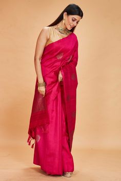 Look your ethnic best on special occasions in this rani pink tussar Banarasi saree. It has an antique zari pallu and zari buta. The saree comes with a green blouse piece. Disclaimer: The shown stitched blouse on the model is for display purpose only. The saree comes with a matching blouse piece and finished with fall and piko. Semi-stitched Chanderi Saree With Tilla Detailing, Semi-stitched Chanderi Saree With Tilla, Chanderi Saree Semi-stitched With Tilla, Pink Handloom Raw Silk Pre-draped Saree, Designer Pink Slub Silk Pre-draped Saree, Pink Slub Silk Pre-draped Saree For Designer Wear, Pink Handloom Slub Silk Pre-draped Saree, Festive Art Silk Saree With Tilla, Pink Tussar Silk Saree With Zari Weaving