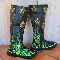 Make Me An Offer! Custom Painted And Sealed For Durability One-Of-A-Kind! Never Find Another Rocking These Bad Boys Brand New, Very Comfortable Durable Pleather Black Boots Green Flames And Yellow Stars Make These Your New Hot Fashion Item Zips Up The Side And Has Soft Fabric Lining Fits Size 8.5-9 Designed And Painted By Artist Olive Love Of Kozmic Kind Custom Black Leather Boots, Funky Black Round Toe Boots, Funky Black Boots With Round Toe, Painted Leather Boots, Hand Painted Boots Diy, Painted Leather Shoes, Flame Cowboy Boots, Boots With Stars, Flame Boots