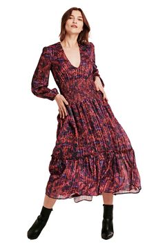 image of a female model wearing a AMELLIA DEEP V DRESS PLUM PAISLEY DEAR JOHN DENIM Fall Midi Dress With Smocked Cuffs, Fall Tiered Dress With Smocked Back, Fall Maxi Dress With Billowy Elastic Sleeves, Chic Tiered Skirt Dress With Smocked Cuffs, Chic Dresses With Smocked Cuffs And Tiered Skirt, Fall Tiered Dress With Smocked Bodice, Fall V-neck Smocked Dress, Flowy Long Sleeve Smock Midi Dress, Fall V-neck Smocked Dress With Smocked Cuffs