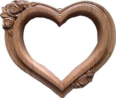 a wooden heart shaped frame with roses on the edge and bottom, in brown wood