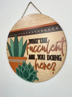 a wooden sign that says what the faucet are you doing here?