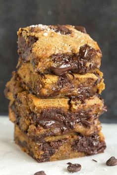 chocolate chip cookie bars stacked on top of each other with the title overlaying