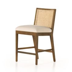 a wooden chair with a white seat and back cushion on an isolated white background,