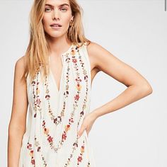 100% Cotton Hi-Lo Tunic In Ivory. Has Beaded Flower & Vine Detail In Front & Back. Sleeveless. Ties At Neck. Tag Price Is $228. I Cannot Find This Item In Stock Photos & I Do Not Have Original Bag. But Tags & Extra Beading Is Attached. Size L. Smoke Free/Fur Free Home! Summer Sleeveless Dress With Embroidered Neckline, Sleeveless Summer Dress With Embroidered Neckline, Chic Sleeveless Beaded Dresses, Chic Beaded Summer Dresses, Summer Beaded Bohemian Dresses, Bohemian Beaded Summer Dress, Summer Bohemian Beaded Dresses, Bohemian Beaded Dresses For Spring, Bohemian Embellished Sleeveless Dress