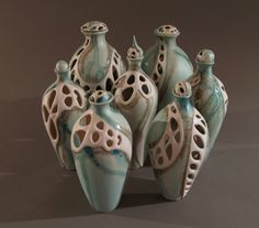 a group of vases sitting next to each other