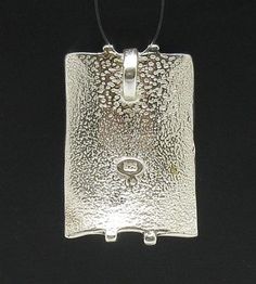 Sterling silver pendant - PE000386. Stamped 925. Approximate WEIGHT 8.3 GRAMSDIMENSIONS 3.0x2.0cm(1.2x0.8inches)BAIL INTERNAL DIAMETER 0.5cm(0.2inches)All our jewels are made from solid sterling silver 925/1000 and are carefully crafted by hand in our family workshop.We dispatch your orders in 5 working days, worldwide and the postage is $5. We ship registered priority mail. Please allow 5-7 working days for delivery in Europe and 10-15 working days outside Europe.For any questions – please do n Silver Sterling Silver Large Pendant Jewelry, Silver Rectangular Necklace With Polished Finish, White Gold Jewelry With Large Rectangular Pendant, Silver Hammered Rectangular Pendant Jewelry, Silver Hammered Oval Pendant Jewelry, Sterling Silver Rectangular Pendant With Polished Finish, Silver Rectangular Pendant With Polished Finish, Hammered Sterling Silver Rectangular Pendant Jewelry, Sterling Silver Hammered Rectangular Pendant Jewelry