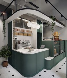 the interior of a coffee shop with green and white decor