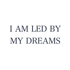 the words i am led by my dreams written in black ink on a white background