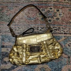 Small Gold Guess Purse. Never Used! Perfect Condition. Make Me An Offer! Guess Mini Satchel, 2000s Guess Bag, Guess Y2k Bag, Guess Hand Bag Black, Guess Shoulder Bag Sofybrands, Guess Purses, Guess Bags, Mini Bag, Bag Lady