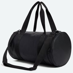 a large black duffel bag with straps