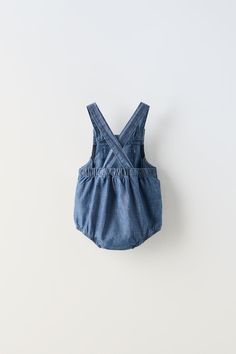 FLOWY DENIM ROMPER - Mid-blue | ZARA United States Medium Wash Cotton Denim Jumpsuit With Button Closure, Medium Wash Summer Overalls For Everyday, Summer Everyday Medium Wash Overalls, Everyday Summer Medium Wash Overalls, Summer Denim Jumpsuit For Everyday, Dark Wash Buttoned Cotton Denim Jumpsuit, Light Wash Denim Overalls With Button Closure, Everyday Cotton Zara Jeans, Zara Cotton Everyday Jeans