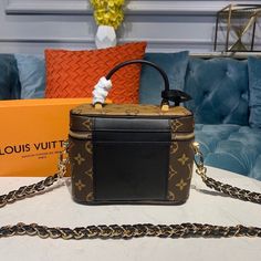 Description   L.V Vanity PM Monogram And Monogram Reverse Canvas By Nicolas Ghesquiere For Women,  Shoulder And Crossbody Bags 7.5in/19cm LV M45165  Rep 1:1     For Spring-Summer 2020, Nicolas Ghesquière has dreamed up a modern-day ode to L.V’s travel heritage: an update of the Nice vanity kit as a trendy city bag in Monogram and Monogram Reverse canvas. Lightweight, compact and supple, it’s easy to carry everywhere, in the hand, on the shoulder or cross-body with its removable chain strap.     19 x 13 x 11 cm / 7.5 x 5.1 x 4.3 inches (Length x height x width)   Monogram and Monogram Reverse coated canvas  Microfiber lining  Gold-color hardware  Double zip closure with padlock  Inside flat pocket  Key bell  4 protective bottom studs  Chain: Removable  Handle: Single   –  Includes box, dust Louis Vuitton Vanity, Baby Tote Bag, Pm Monogram, Reverse Canvas, Chanel Shirt, Nicolas Ghesquiere, City Bag, Bottega Veneta Shoulder Bag, Evening Clutch Bag