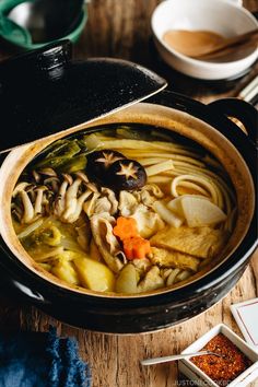 a close up of a bowl of food on a table