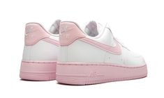 The Nike Air Force 1 Low '07 has returned with yet another vibrant colorway of the iconic silhouette.  A pastel update for the white sneaker fan, this low-top Air Force 1 features a light pink take on the brand’s signature Nike Swoosh on the side and heel tab.  On the lower half, a corresponding light pink sole completes the look and juxtaposes nicely with the all-white leather up top.  Nike Air branding appears on the tongue, heel, and midsole. Yellowstone T Shirts, Foams Shoes, Foam Shoes, Nike Air Force 1 Custom, Air Force 1 Custom, Top Nike, Nike Air Force 1 Low, Custom Nikes, Nike Swoosh