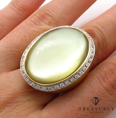 Bold and Fashionable Lemon QUARTZ over Mother-of-Pearl Ring with DIAMONDS in bright and rich 18k Yellow Gold.A real fun Statement jewel, a gear Right Hand or Anniversary Ring! From our Estate Collection. The ring is in 18K Yellow GOLD with satin finish. The Cabochon Gold Lemon Quartz set over Mother-of-Pearl that gives incredible , one of a kind glow within the Gemstone and surrounded by small Brilliant Diamonds, approx. 0.95ct, G-H color VS-SI in clarity over all. Well matched and brilliant.VER Luxury Yellow Gold Pearl Ring With Cabochon, Estate Ring, Estate Rings, Lemon Quartz, Pearl Diamond, Golden Color, Brilliant Diamond, Anniversary Ring, Pearl Ring