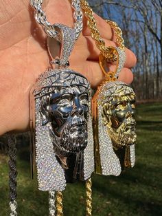 two chains that have been made to look like head pendants