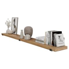 a wooden shelf with books and vases on it