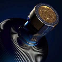 a bottle of blue and gold wine on a black surface