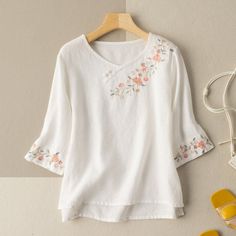 Details: Gender: Women Item Type: T-Shirt Material: Cotton Linen Pattern Type: Floral Season: Spring, Summer, Autumn Style: Leisure, Daily, Retro Occasion: Going Out, Daily Color: White, Purple, Yellow, Pink Size: M Length: 59.00 cm/ 23.23 " Bust: 96.00 cm/ 37.80 " Shoulder: 38.00 cm/ 14.96 " Size: L Length: 60.00 cm/ 23.62 " Bust: 100.00 cm/ 39.37 " Shoulder: 39.00 cm/ 15.35 " Size: XL Length: 61.00 cm/ 24.02 " Bust: 104.00 cm/ 40.94 " Shoulder: 40.00 cm/ 15.75 " Size: 2XL Length: 62.00 cm/ 24. Loose Tunic, Linen Tshirts, Summer Attire, Classic Chic, Embroidered Blouse, Embroidered Shirt, Flared Sleeves, Silk Blouse, Floral Embroidery