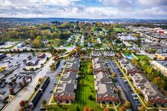 an aerial view of a neighborhood in the fall