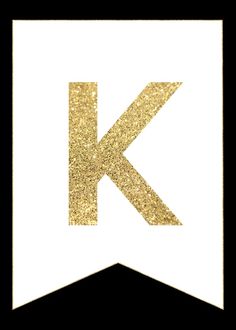 the letter k is made up of gold glitter