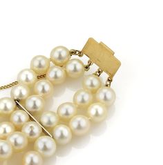 "This gorgeous retro bracelet has four strands of cream tone lustrous 7mm pearls. The rectangular box shape clasp is lovely with filigree floral design and chain attached for added security. Close to the clasp is a long bar on each side securing the strands together. Material: 14k yellow gold Measurement: inner circumference: 6.5\" band is 1.06\" wide x 0.26\" high Weight: 46.2 grams" Classic Multi-strand Jewelry For Formal Occasions, Elegant Cream Bracelet For Formal Occasions, Elegant Cream Bracelet For Formal, Cream Colored Bracelet For Formal Occasions, Cream Bracelet For Formal Occasions, Cream Colored Formal Bracelet Jewelry, Cream Formal Bracelet Jewelry, Vintage Yellow Gold Pearl Bracelet For Formal Occasions, Formal Multi-strand Yellow Gold Jewelry