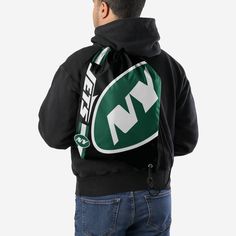 Whether you're going to work, class, or the gym, make sure you always put the team on your back. Literally. Store your stuff and show off your team spirit with this New York Jets Black Alternate Color Big Logo Drawstring Backpack. Features Easy adjustable cinch top cords to make storing your stuff quick and easy Screen printed design so everyone knows who you're rooting for on gameday Details Dimensions: Approximately 18 in. x 14 in. Volume: Approximately 4L Officially licensed Imported On-the-go Backpack With Branded Hardware, On-the-go Backpack With Zipper Closure And Top Handle, Eagles Kelly Green, Team Spirit, Screen Printing Designs, Philadelphia Phillies, New York Jets, San Francisco 49ers, Jet Black