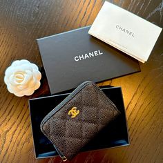 Chanel Black Caviar Quilted Zipped Coin | Card Wallet. Chanel's Classic Caviar Leather? Fits Most Credit Cards/Dls? Perfect Sized Zipped Coin Purse? Free Poshmark Authentication? Material: Caviar Leather Measurements: 2.9 4.3 0.8 In Style: Classic Zipped Coin Purse Chanel Ref. Number: 24s Ap3995 B10583 (2024 Summer Collection Spring Act 2 Edition) Color: Black And Burgundy (With Champagne Gold Hardware) 100% Authentic (Purchased In 2024) Condition: Great Condition. Like New. Accessories: Full Se Chanel Classic Zipped Coin Purse, Champagne Gold Hardware, Purse Chanel, Leather Fits, Coin Card, Camellia Flower, Chanel Accessories, Black Caviar, Chanel Black