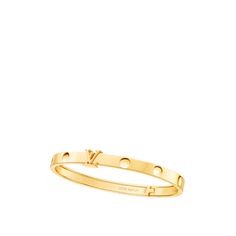 To reserve online today and experience in store tomorrow, select “collect in store” at checkout. This empreinte bangle in 18-carat yellow gold features the trunk-nail imprints, a timeless house signature. The iconic lv initials join here the collection and serve as a clasp for this strong hinged bracelet. The empreinte bangle can be worn stacked on the arm with other bracelets, for a stylish, modern look. Designer Yellow Gold Bangle Bracelet, Luxury Yellow Gold Engraved Bangle, Luxury Engraved Yellow Gold Bangle, Lv Empreinte, Vision Manifestation, Louis Vuitton Gifts, Men's Brooch, Louie Vuitton, Micro Bags