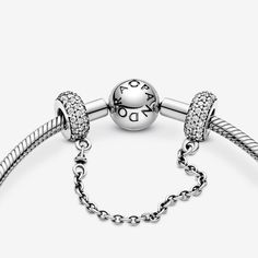 You've collected the charms that celebrate your memories and mark your milestones, now keep them safe on your Pandora Moments bracelet with this sterling silver safety chain charm. Accented with cubic zirconia for a sparkling finish, it's decorative in its own right and fitted with a swivel chain for tangle-free styling. Pandora Safety Chain, Pandora Moments Bracelet, Pandora Inspiration, Charms Pandora, Bracelet Pandora, Stamped Bracelet, Safety Chain, Dangle Charms, Pandora Bracelet