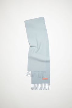 Acne Studios powder blue fringe scarf is crafted from rich wool, detailed with an Acne Studios logo pink label patch. Suit Jacket Dress, Logo Pink, Studio Logo, Fringe Scarf, Buckle Boots, Pink Logo, Leather Buckle, Shearling Jacket, Wool Scarf