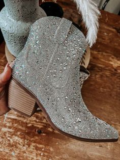 These Rhinestone Saints & Rebels Cowgirl Boots are sure to be a hit whatever you pair 'em with! From jeans to dresses and shorts to skirts, they are encrusted with a variety of sized rhinestones to add a bit of glam to your country roots. Plus, they have a 2.5" heel will keep you struttin' around with a little extra sass! Fit's as expected. Rhinestone Cowgirl Boots, Carrie Underwood Concert, Cowgirl Rhinestone, Rhinestone Boots, Rhinestone Cowgirl, Cowgirl Wedding, Ashley White, Cowgirl Boot, Fantastic Shoes