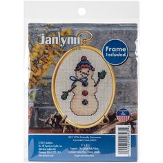 the janlynn snowman cross stitch kit is packaged in a package with plastic backing