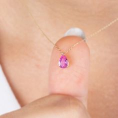 "Another name for sapphire is sky ruby and it is known to create loyalty between couples. Let our pink sapphire necklace symbolize your love. Pink sapphire symbolizes those born in October. 🤍🤍 Special gifts for your special moments. We produce our jewelery for you in the most perfect way. 🤍🤍 All of our products are made of 14K Solid gold. FEATURES * Made to order. * Gold Color Selection: Yellow Gold, Rose Gold, White Gold * Gold KT: 14K * Length: 14\", 16\", 18\", 20\", 22\",24\" * Sapphire Pink 14k Gold Pear-shaped Jewelry, Pink Pear-shaped 14k Gold Jewelry, Fine Jewelry Teardrop Birthstone Necklace Gift, Pink Birthstone Teardrop Pendant Jewelry, Pink Teardrop Pendant Birthstone Jewelry, Pink Pear-shaped Gemstone Necklace, Dainty Pink Gemstone Birthstone Necklace, Pink Sapphire Necklace, Born In October