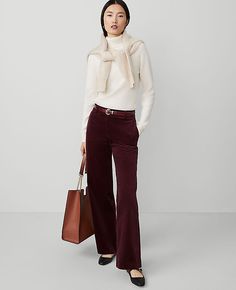 A modern must-have with a statement leg and flattering high waist. Front zip with double hook-and-bar closure. Belt loops. Front off-seam pockets. Back besom pockets. Lined.,Leg Shape:Wide Leg – a modern must-have with a statement leg and flattering high waist,Rise:High rise: sits 1/2" to 1" below natural waist,Imported:Imported,Fit:Relaxed & easy,Length:Full length: 31" inseam with 23" leg opening,Fabrication:98% Cotton, 2% Spandex,Garment Care:Machine Washable The Wide-Leg Pant in Corduroy by Leather Pants Christmas Outfit, Burgundy Corduroy Pants Outfit, Mauve Pants Outfit, Ann Taylor Outfits, Mauve Pants, Ann Taylor Outfit, Corduroy Pants Outfit, Maroon Pants, Stylish Outfits For Women Over 50