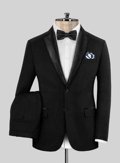 The Deep Black Tuxedo Suit commands the spotlight with its sharp razor-like cut and dark black color that's deeper than most standard black tuxedo suits. This tuxedo suit is crafted from pure wool and features an exceptional quality all-seasonal fabric. However, due to its formal nature, it's best suited for evening events with a black tie dress code, such as weddings or corporate events.  
 
 Featuring satin lapel, matching satin covered buttons and gentle texture at its surface, our tuxedo is Black Tailored Three-piece Tuxedo Suit, Tailored Black Three-piece Tuxedo Suit, Classic Black Three-piece Suit For Black-tie Events, Black Tuxedo Three-piece Suit, Black Three-piece Tuxedo For Black Tie Events, Black Tailored Three-piece Suit For Black Tie Events, Black Fitted Tuxedo For Formal Occasions, Custom Fit Black Suit For Black Tie Events, Black Custom Fit Suit For Black Tie Events