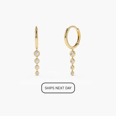 Dangle Earrings / Diamond Earrings / 14k Gold Dangling Diamond Drop Earrings / Dangling Diamonds on Gold Hoop Earrings Ferkos Fine Jewelry Item Details * Made to Order. * Gold Kt: 14K * Custom Gold Color: Rose Gold, Yellow Gold, White Gold * Inner Diameter: 12.00 MM * Outer Diameter: 14.00 MM * Round Diamonds: 2 pcs 2.90 MM * Round Diamond: 2 pcs 2.40 MM * Round Diamond: 2 pcs 1.90 MM * Round Diamond: 2 pcs 1.70 MM * Total CTW: 0.45 (pair) * Diamond Color-Clarity: G Color  SI1 Clarity * Setting Type: Bezel Setting ▶ See more of our Diamond Earrings - http://etsy.me/2lyqVBP ▶ See our storefront here - http://etsy.me/2lUcVnH  ▶ All store sections here * Diamond Rings - http://etsy.me/2lwKUl8 * Diamond Earrings - http://etsy.me/2lyqVBP * Diamond Necklace - http://etsy.me/2mqa6O1 * Diamond Bra Earrings Dangling, Gold Armband, Diamond Dangle Earrings, Earrings Diamond, Ruby Jewelry, Diamond Drops, Emerald Jewelry, Sapphire Jewelry, Diamond Color