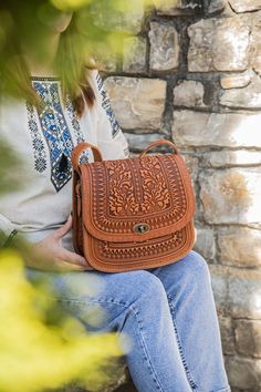 Model 'OAK LEAVES', big size Unique handmade bag made of premium 4 mm genuine calf leather.  Made using rare technology of hot tooling. Ornamented with oak leaves and acorns images. Super comfortable, durable and functional. Has one big compartment, one internal zip-pocket and one button pocket, e.g. for cell phone or keys. Dimensions: 26x25x9 cm ((10.3x9.8x3.5 in) Strap length 140 cm (55 in) If you want a different color bag, just write it in the personalization field! Mixing colors is also an Embossed Satchel Shoulder Bag For Everyday Use, Embossed Crossbody Satchel For Daily Use, Embossed Crossbody Shoulder Bag For Daily Use, Embossed Crossbody Shoulder Bag For Everyday Use, Embossed Crossbody Bag For Everyday Use, Embossed Shoulder Bag For Travel, Everyday Embossed Crossbody Shoulder Bag, Everyday Embossed Crossbody Bag, Daily Use Embossed Crossbody Shoulder Bag