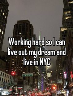 a city street at night with the words working hard so i can live out my dream and