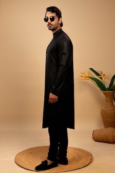 Black asymmetric hemline silk kurta. Paired with a churidar. - Aza Fashions Brown Quilt, Kurta Set Men, Black Kurta, Men Kurta, Quilted Patchwork, Nehru Jacket, Silk Kurta, Nehru Jackets, Churidar