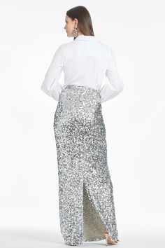 Timeless luxury meets statement with the Isolde Skirt in silver sequins. Crafted from a stretch Mikado fabric for an ultra-flattering fit, the full length silhouette hugs in all the right places. Elegance and glamour abounding, Isolde is an emblem of class.Details:Model is 5'9" wearing size 2Full-Length, 58" from top of shoulder to bottom hem39 1/2" Skirt LengthBack ZipperScatter Sequins95% Polyester, 5% SpandexImportedStyle #F242S04-040 Sachin And Babi, Silver Sequin Skirt, Embroidery Business, Mikado Fabric, Fashion Institute Of Technology, Daytime Wedding, Sachin Babi, Full Midi Skirt, Fashion Institute