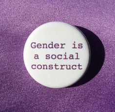 a button that says gender is a social construct