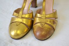 "1930s metallic gold leather t-strap heels. Marked a size 6.5 AA - but they measure 9 5/8\" long inside from toe to heel and 2 5/8\" wide inside, which would make them closer to a 8 or 8.5. The heels are 3.5\" tall. They were sold at Harrison Bros. at The Oranges in Montclair, NJ. In good condition, with just some wear to the metallic finish on the toes, and some wear to the soles. ---> If you need an order shipped by a particular date or shipped via a quicker method, please ask PRIOR to purc Gold T-strap Heels For Formal Occasions, Vintage T-strap Heels For Evening, Vintage Gold Heels With Almond Toe, Vintage Gold Almond Toe Heels, Vintage Gold Closed Toe Heels, Montclair Nj, T Strap Heels, Womens Pumps, Photo Heart