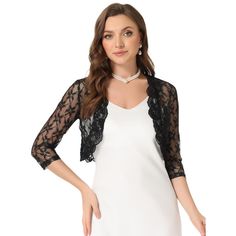 In a floral lace pattern, this stylish pretty top adds a touch of elegance to your wardrobe. This shrug is designed with floral lace, stylish gold decoration, and an open front style for a comfortable fit. Pair it with a beautiful dress or skirt for an elegant and charming look. Elegant Fitted V-neck Shrug, Spring Fitted Shrug With Lace Trim, Spring Lace Shrug With Lace Sleeves, Spring Formal Lace Patchwork Top, Evening Shrug With Lace Trim, Spring Party Lace Shrug, Fitted Shrug With Lace Sleeves For Spring, Spring Party Shrug With Lace Trim, Fitted Lace Cardigan For Party