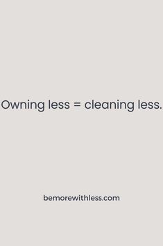 a white wall with the words owning less = cleaning less