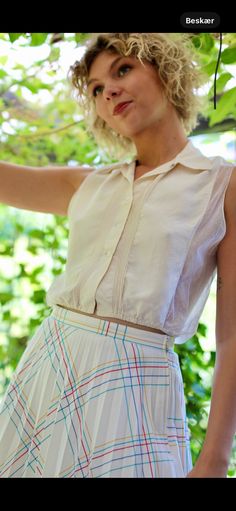 Original cream silk blouse/top with tulle on the back. No Label Materials: Silk, Tulle Front closure with 4 buttons and one hock at the hem. Excellent vintage conditions. Estimated S/M (see measurements) Measurements (taken with garment laying flat - double chest and waist) Arm pit to Arm pit 45 cm - 17.7 inches Waist 34 cm up to 40 cm -  13.3 to 15.7 inches Back length (from neck bottom to hem) 47  cm - 18,50 inches Follow us on Instagram @by_waltz https://www.instagram.com/by_waltz/ Sheer Fitted Blouse For Daywear, Fitted Sheer Blouse For Daywear, Summer Blouse With Sheer Sleeves For Daywear, Cream Blouse With Sheer Sleeves For Spring, Sheer Sleeveless Top For Daywear, Sleeveless Sheer Top For Daywear, Feminine Sheer Tops For Daywear, Sheer Sleeves Top For Spring Daywear, Spring Tops With Sheer Sleeves For Daywear