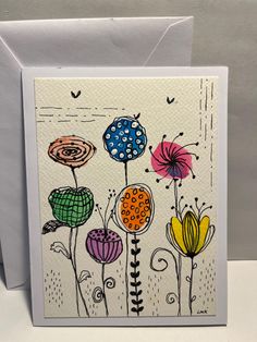 a card with colorful flowers on it